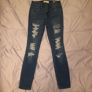 Medium wash distressed Pacsun skinny jeans